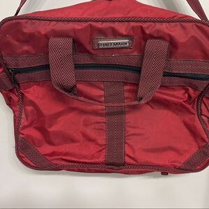 Vibrant Red Duffel Bag with Synthetic Fabric and Zipper Closure